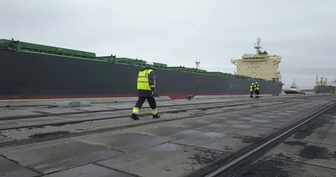 Dock Worker walking Stock Footage 104083117