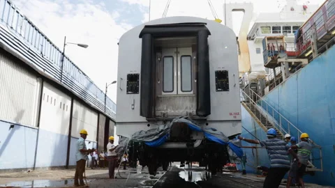 Dock Workers Lower a Train Car Carriage onto Tracks Stock-Footage 160583401