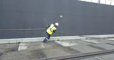 Dock Workers Working An Industrial Port Stock Footage 104083248
