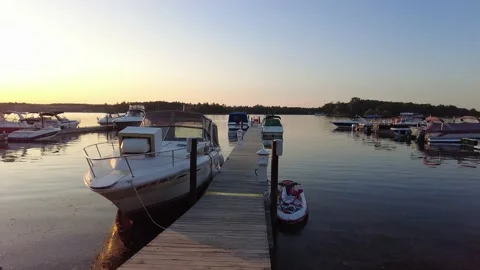 Dockec boats at sunset Stock Footage 157559268
