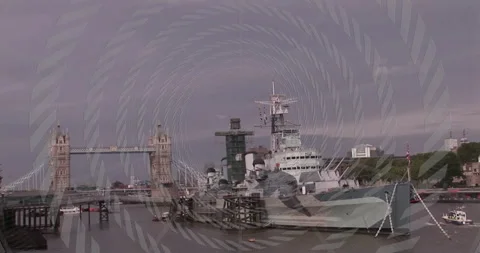 Docked battleship on river with Tower Bridge and animation overlay pattern Vídeos de archivo 305864787