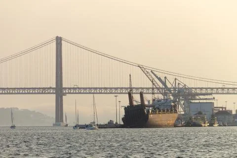 Docked Cargo Ship in the Tagus River Stock Photos