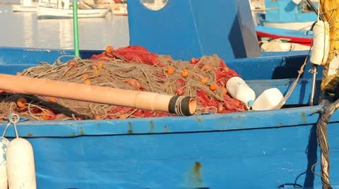 Docked fishing boat with nets Stock Footage 12282753