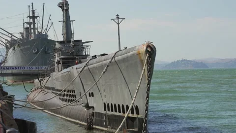 Docked submarine in bay Stock Footage 209598141
