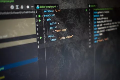 Docker compose file Hello World code on screen Stock Photos