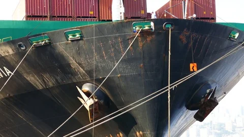 Docking a container ship and apply rat guard Stock Footage 95432576