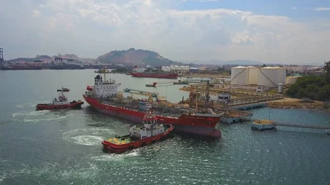 Docking a container ship in a port. Stock Footage 99212235