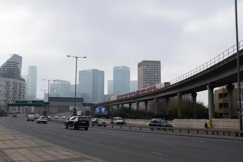 A Docklands Light Railway train approaching East India  Stock Photos