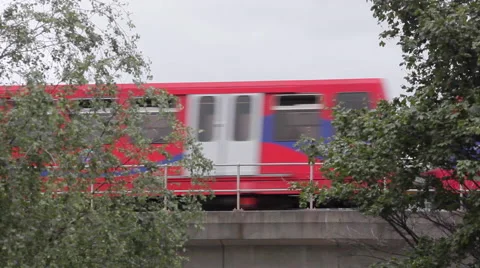 Docklands Light Railway train on bridge 4 Stock Footage 52974425