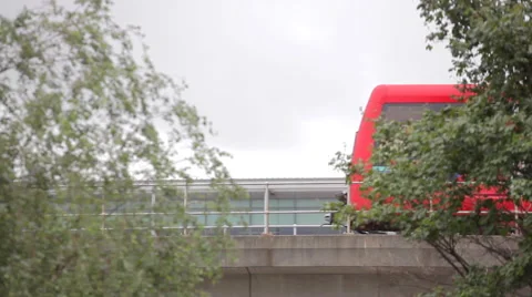 Docklands Light Railway train on bridge 3 Stock Footage 52974709