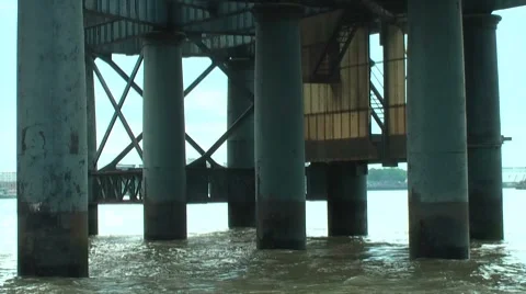 Docklands scenery River thames Under Pier Stock Footage 8776821