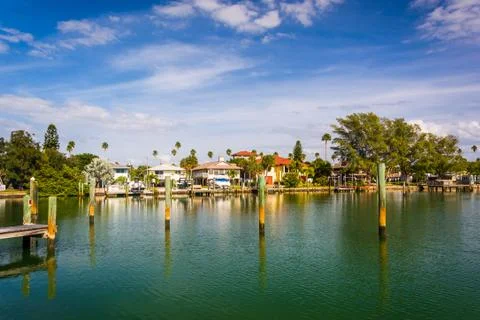 Docks and houses along little mcpherson bayou in st. pete beach, florida Stock Photos