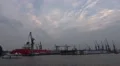 Docks and sightseeing boat at evening in Hamburg harbour HD Footage
