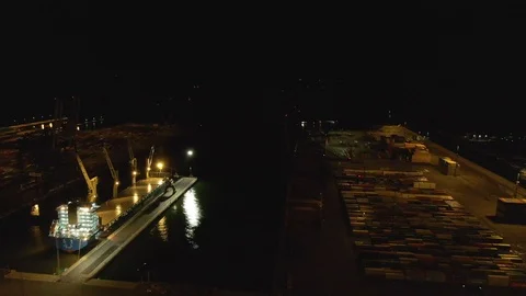 Docks at dark night. Drone flying over harbor, big ship and loading Stock Footage 116204191