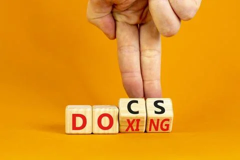 Docs or doxing symbol. Concept words Docs Doxing on wooden block. Beautiful.. Foto stock