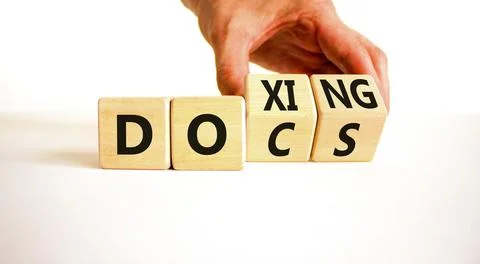 Docs or doxing symbol. Concept words Docs Doxing on wooden block. Beautiful.. Foto stock