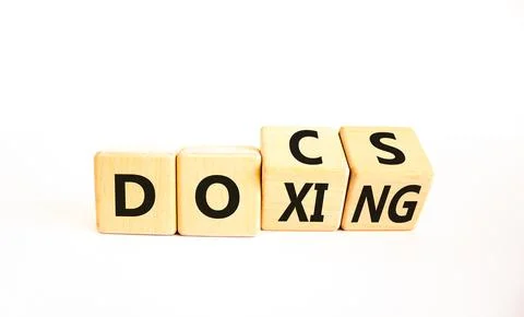 Docs or doxing symbol. Concept words Docs Doxing on wooden block. Beautiful.. Stock-Fotos