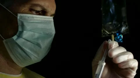 Doctor Administers Injection Stock-Footage 12568512