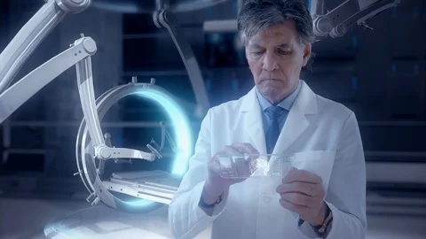 Doctor analyzing CT/ MRI Brain Scan Images on a futuristic touch screen device. Video stock 106695945