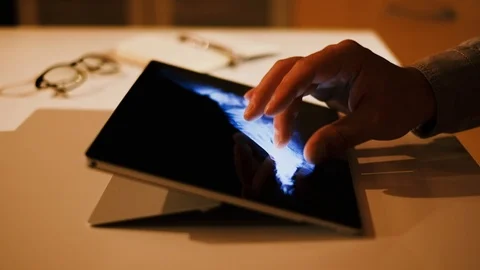 Doctor analyzing medical data on touchscreen computer Stock Footage 93621915