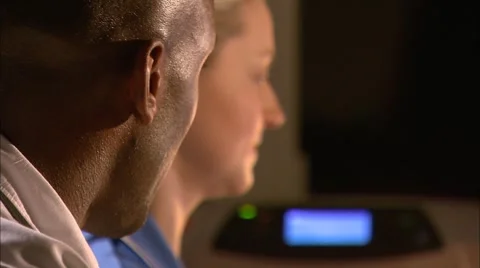 Doctor and nurse using computer Stock Footage
