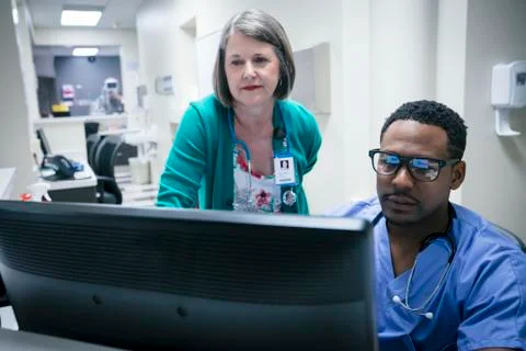 Doctor and nurse using computer Foto stock