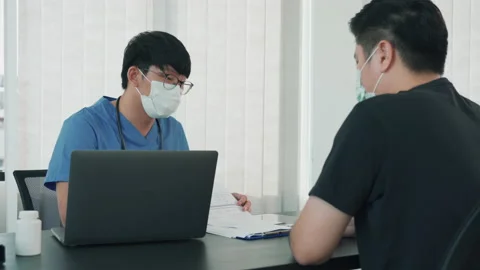 Doctor and patient  talking Stock Footage 155331604