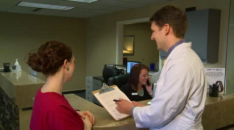 Doctor and staff notes 2 Stock Footage 50670131