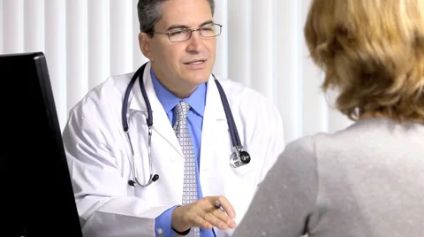 Doctor and woman patient Stock Footage