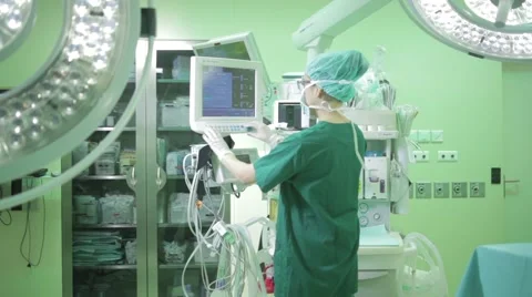 Doctor is approaching to anaesthesia machine Video stock 41636692