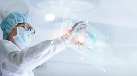 Doctor checking brain testing result with virtual computer interface 库存照片