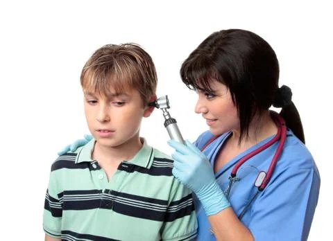 Doctor checking ears Stock Photos