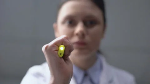 Doctor checking eyes reaction for light, emergency paramedic helping patient Video stock 109619361