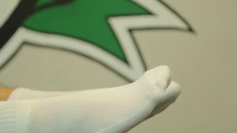 Doctor checking man's ankles, close up Stock Footage 74388722