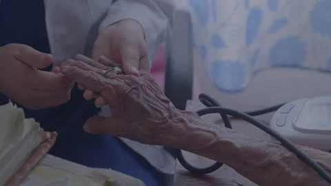 Doctor checking old age man hand Stock Footage 255427655