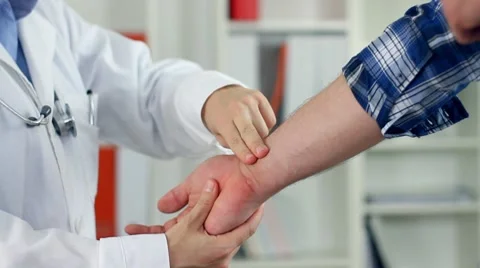 Doctor checking patient pulse HD Stock Footage 8848880