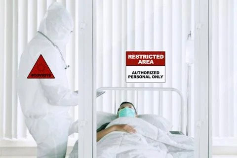 Doctor checking patient while using tablet Fotos de archivo