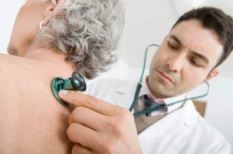 Doctor Checking Patient's Back Using Stethoscope Stock Photos