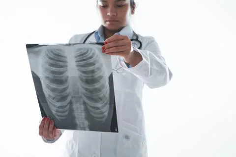 A doctor checking up an x ray Stock Photos