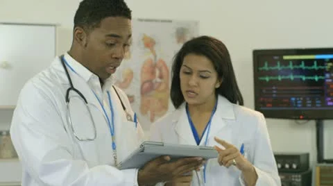 Doctor checks her paitent Stock Footage