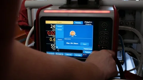 Doctor clicks on the screen of the cardiograph connected to a premature baby Stock Footage 111819857
