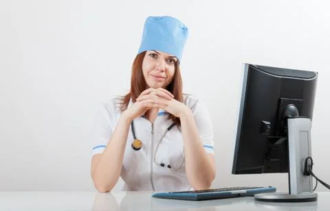 Doctor at a computer Stock Photos