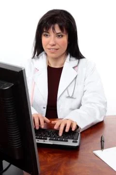 Doctor at computer Stock Photos
