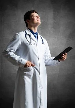 Doctor with a computer tablet Stock Photos