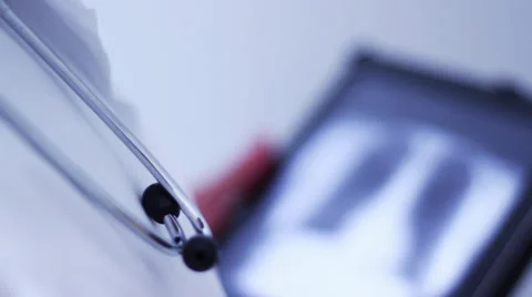 DOCTOR CONTROLLING X-RAY Stock Footage 28190792