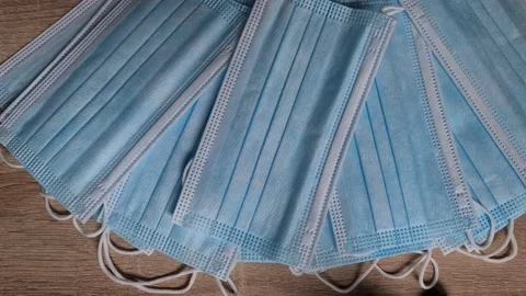  Doctor Counting And Checking Pack Of Surgical Masks One By One Stock Footage 156805100