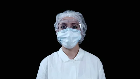 The doctor crosses himself before work Stock Footage 141317312