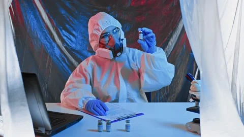 A doctor is developing vaccine or conducting experiment in lab. Laboratory Stock Footage 165338317