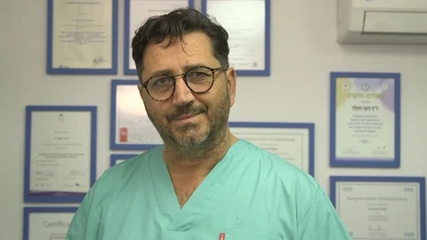 Doctor with diplomas on the wall Video stock 113188965