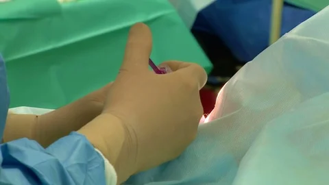 A doctor does injection to patient Stock Footage 83143654